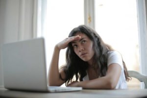 annoyed-female-freelancer-using-laptop