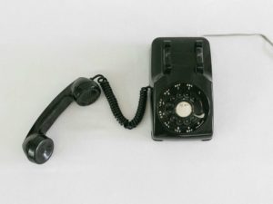 black-and-silver-rotary-phone